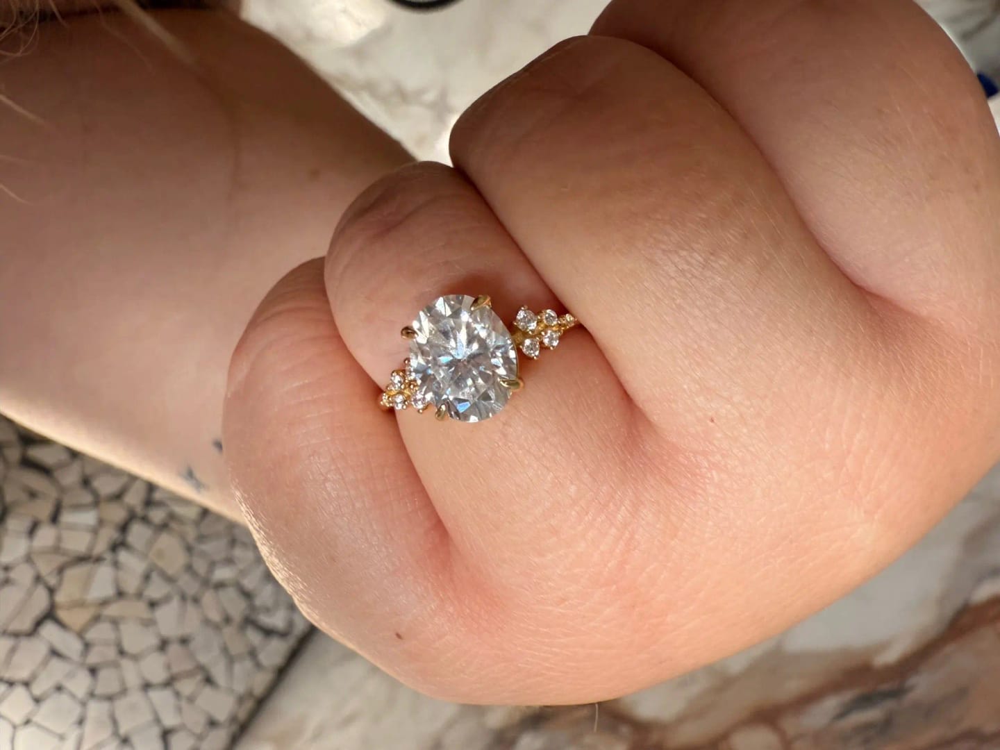 Customer photo review of 3 Carat Oval Cut Moissanite Ring with Cluster Side Stones