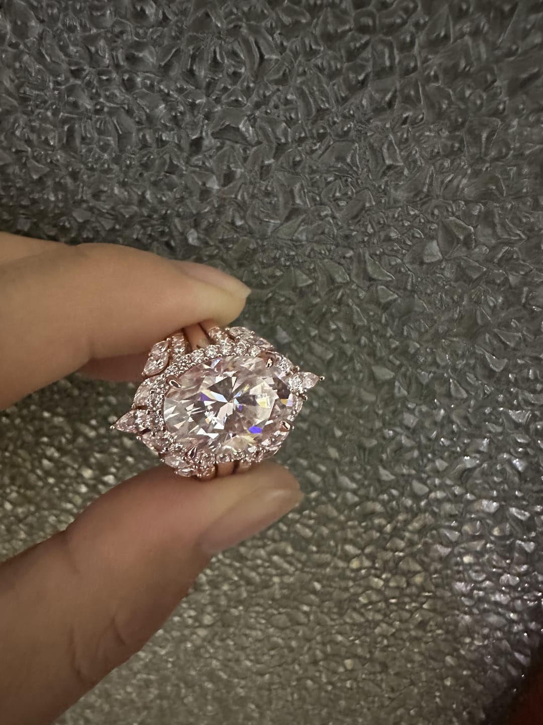 Customer photo review of Sparkling 8.0ct Oval Cut Halo 3PC Wedding Ring Set in Sterling Silver