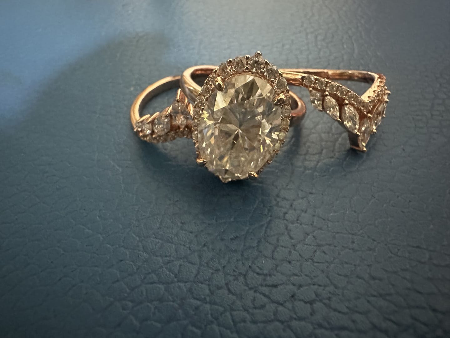 Customer photo review of Sparkling 8.0ct Oval Cut Halo 3PC Wedding Ring Set in Sterling Silver