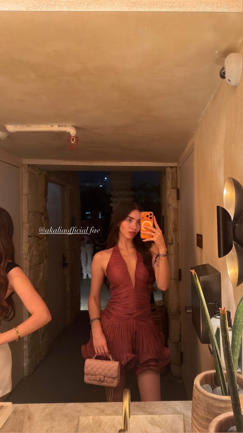 Customer photo review of The Lumiere Metallic Pleated Mini Dress
