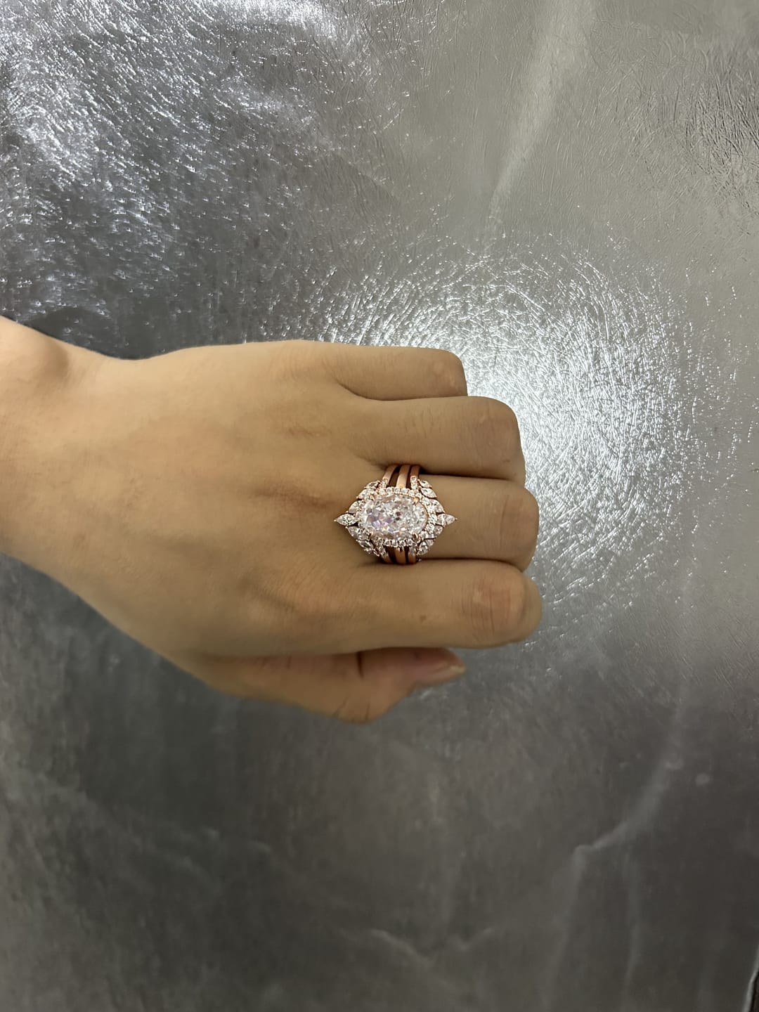 Customer photo review of Sparkling 8.0ct Oval Cut Halo 3PC Wedding Ring Set in Sterling Silver