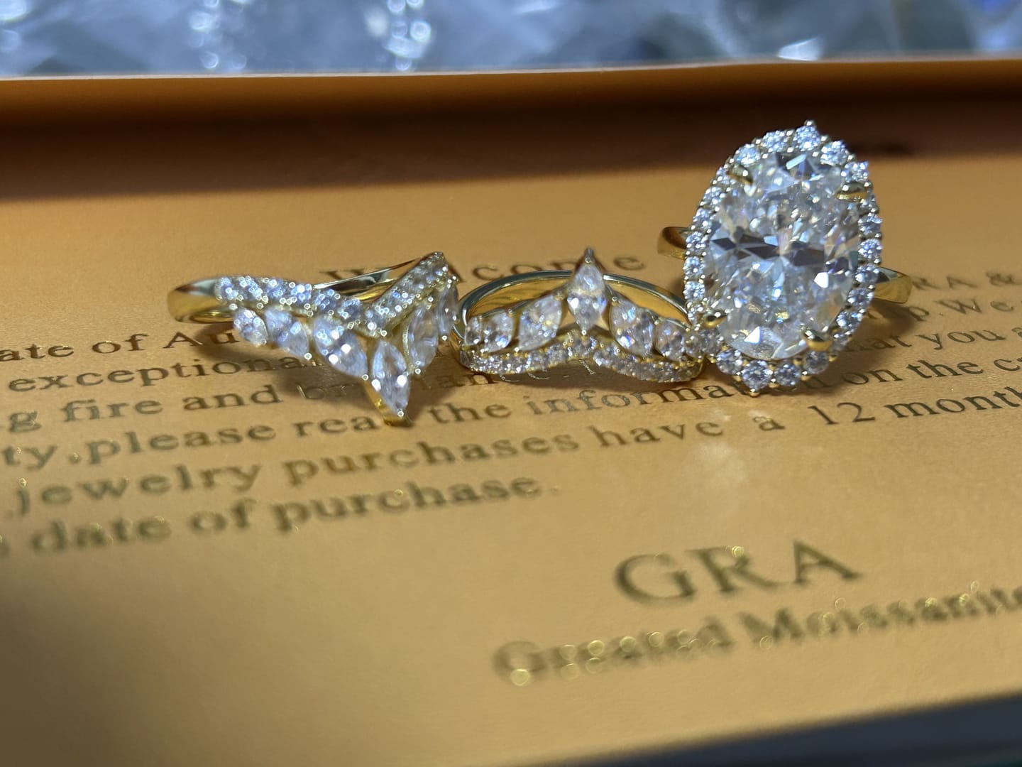 Customer photo review of Sparkling 8.0ct Oval Cut Halo 3PC Wedding Ring Set in Sterling Silver