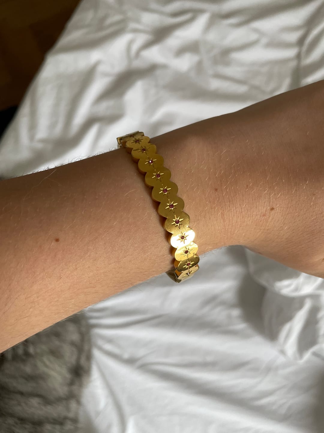Customer photo review of Tallulah Gold Pink Scallop Star Bangle