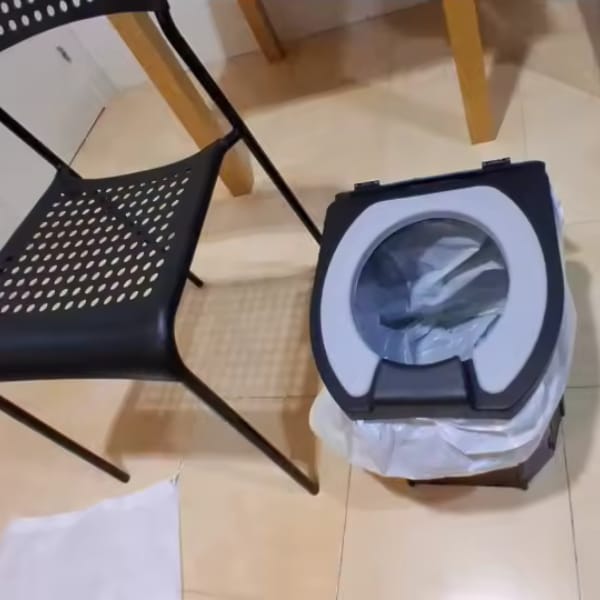 Customer photo review of Toilettes Portables Pliables