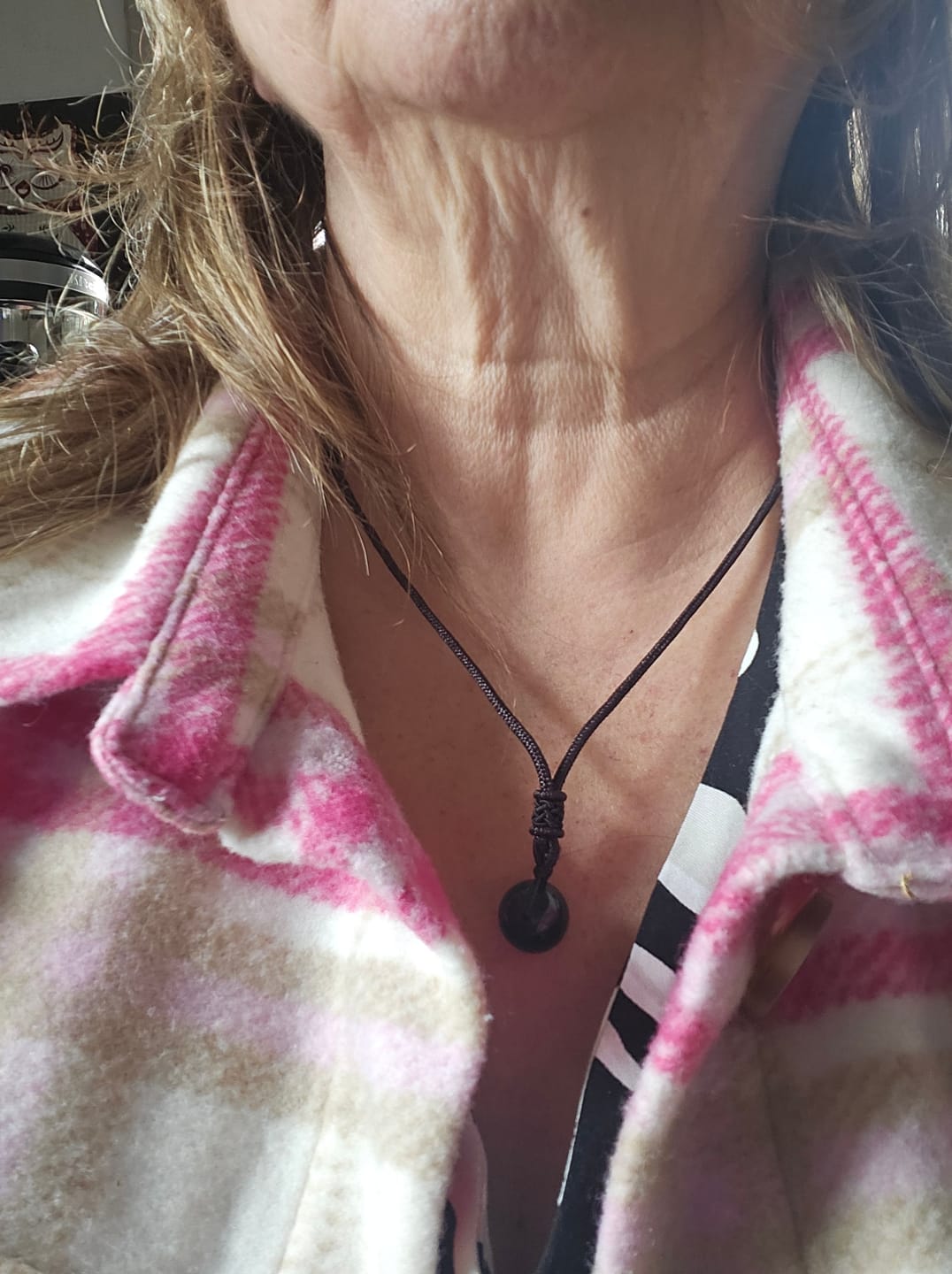 Customer photo review of Pendentif "Sphère" en Obsidienne Dorée