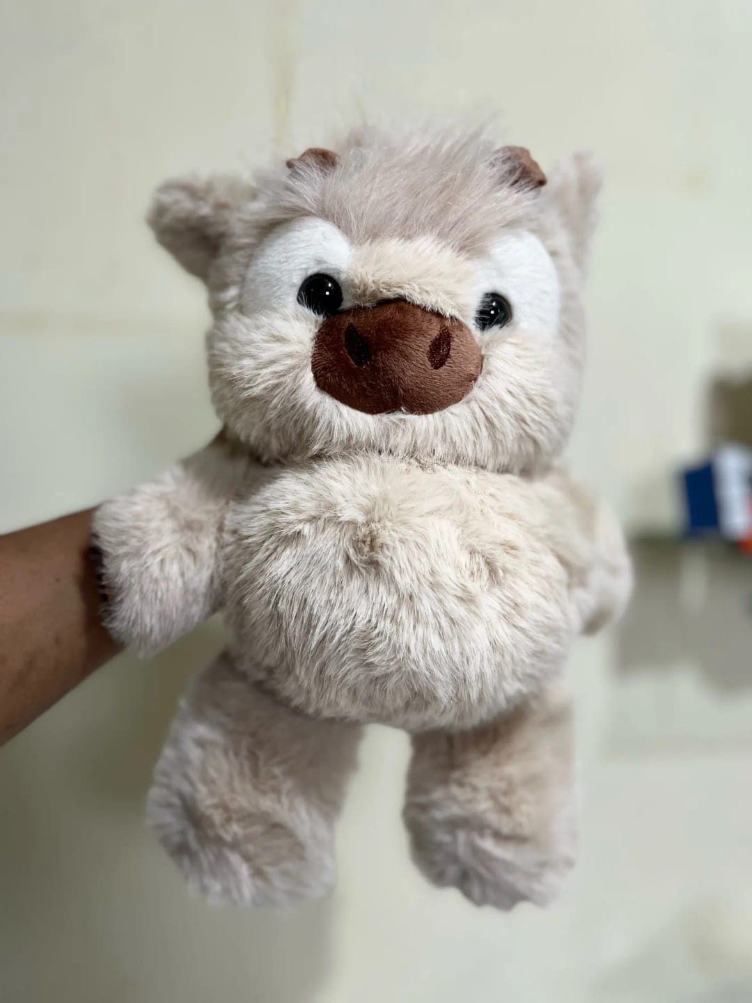 Customer photo review of La peluche vache qui court quand on l’agite | Floomie®