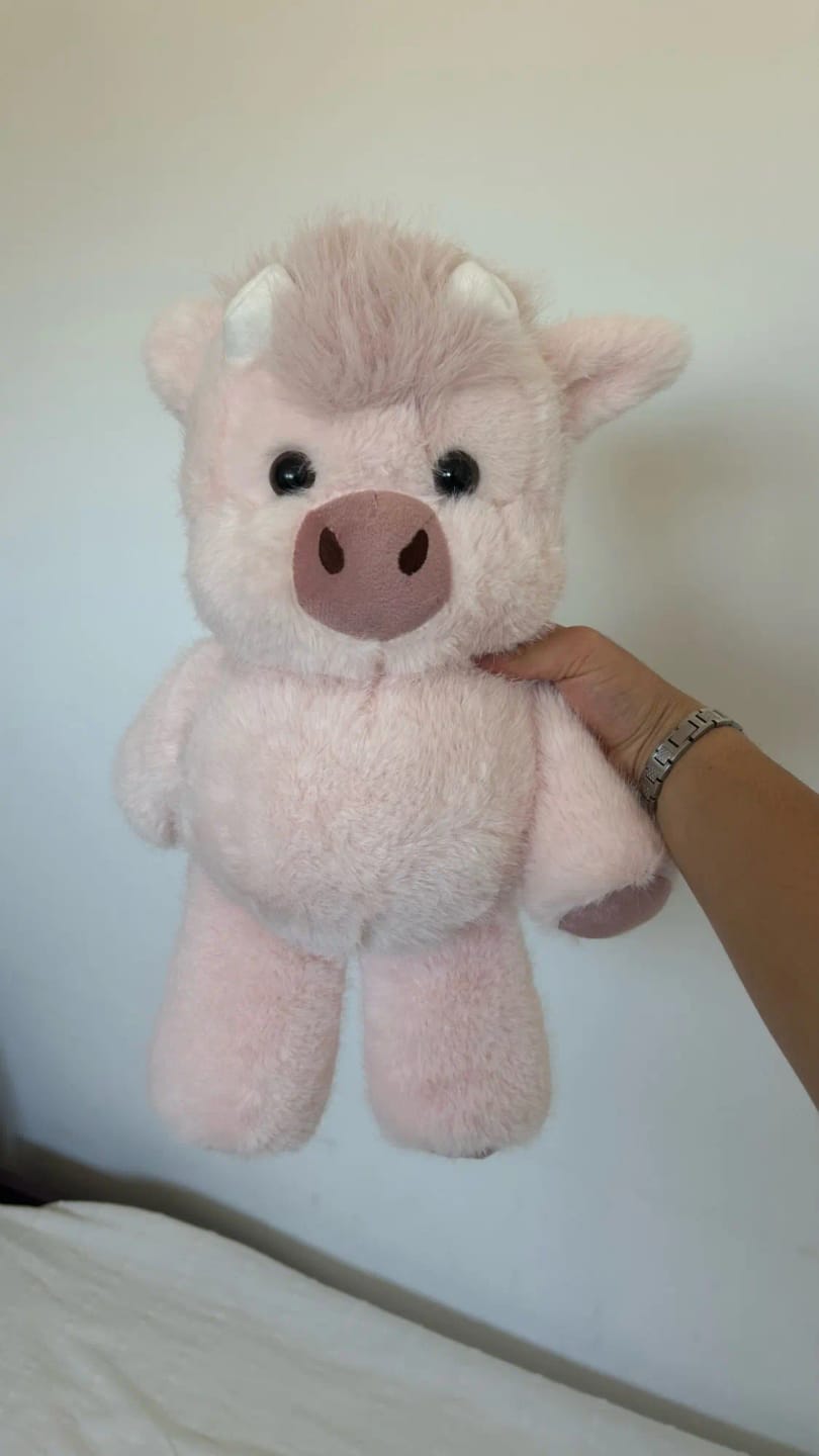Customer photo review of La peluche vache qui court quand on l’agite | Floomie®