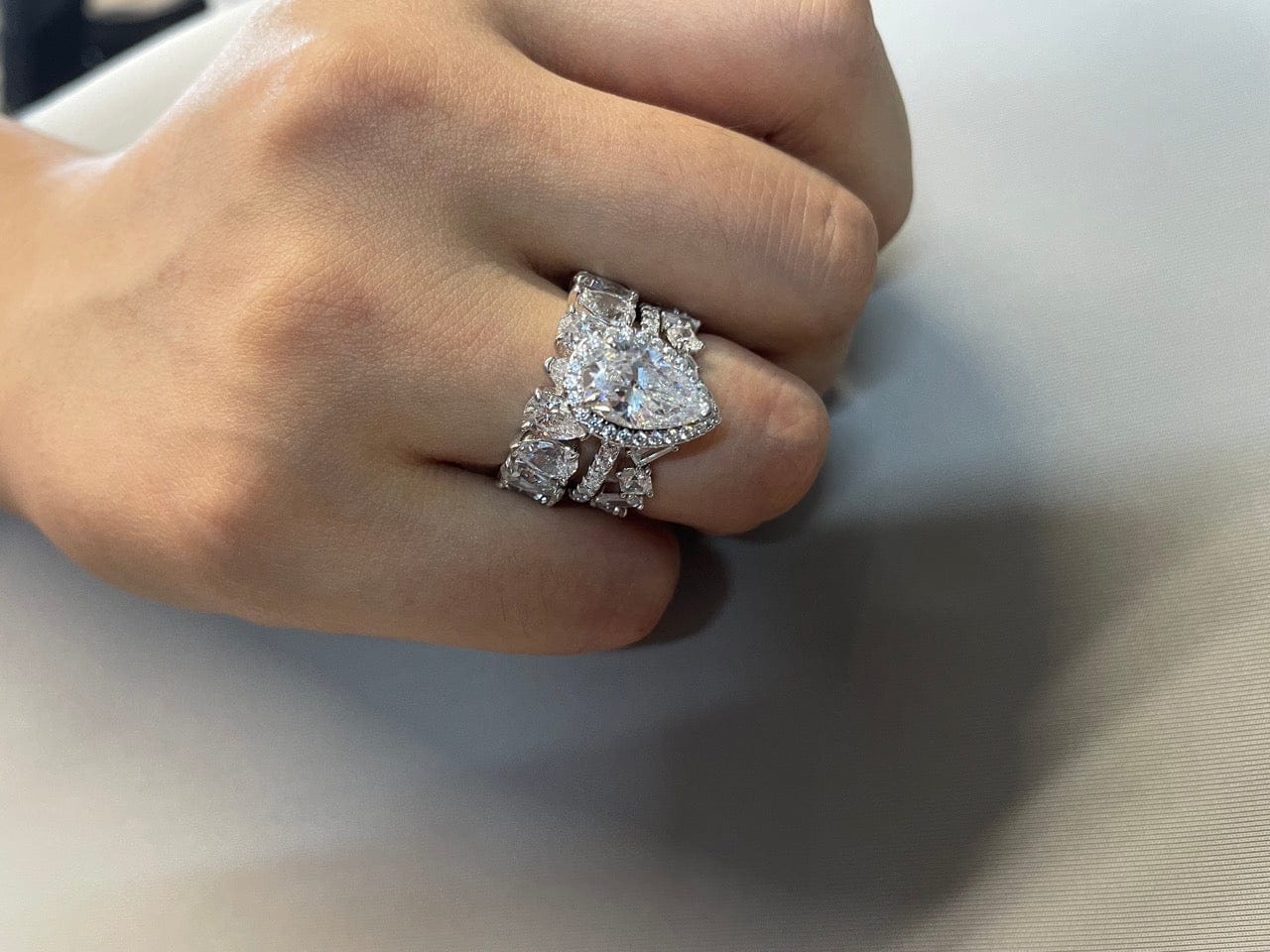 Customer photo review of S925 2.2 Carat Halo Pear Cut Wedding Ring Set With Two Luxurious Wedding Bands For Women