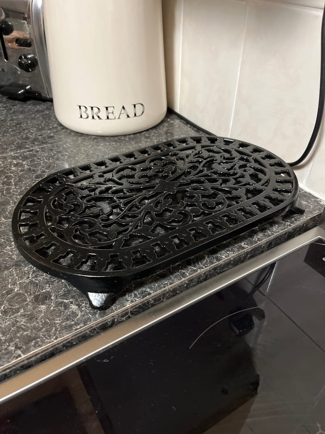 Customer photo review of Traditional Double Trivet · Black ·