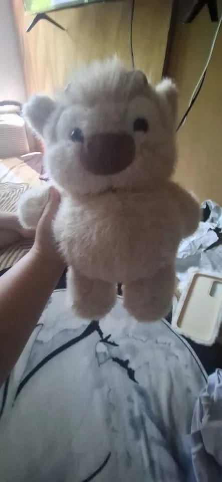 Customer photo review of La peluche vache qui court quand on l’agite | Floomie®