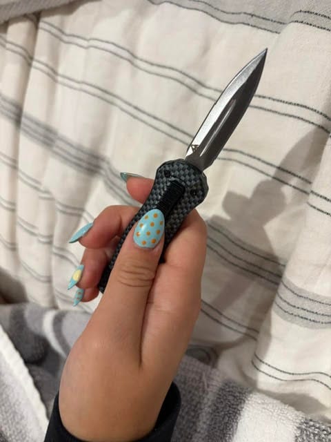 Customer photo review of VT Black Rocket Mini OTF Knife