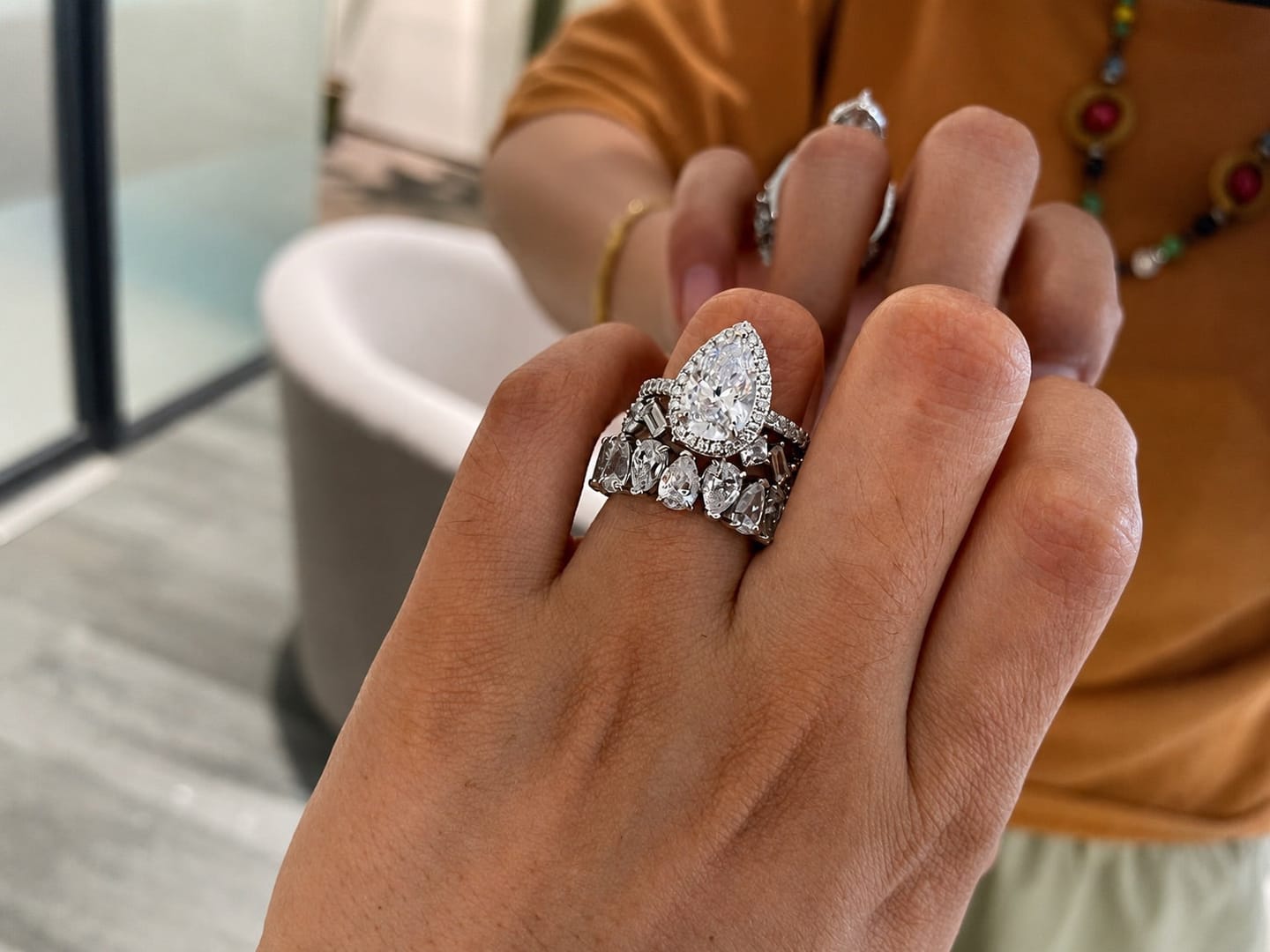 Customer photo review of S925 2.2 Carat Halo Pear Cut Wedding Ring Set With Two Luxurious Wedding Bands For Women