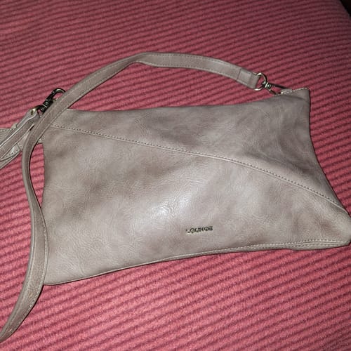 Reseña con foto de un cliente sobre Cartera Bandolera Tassel Fake Suede Boho