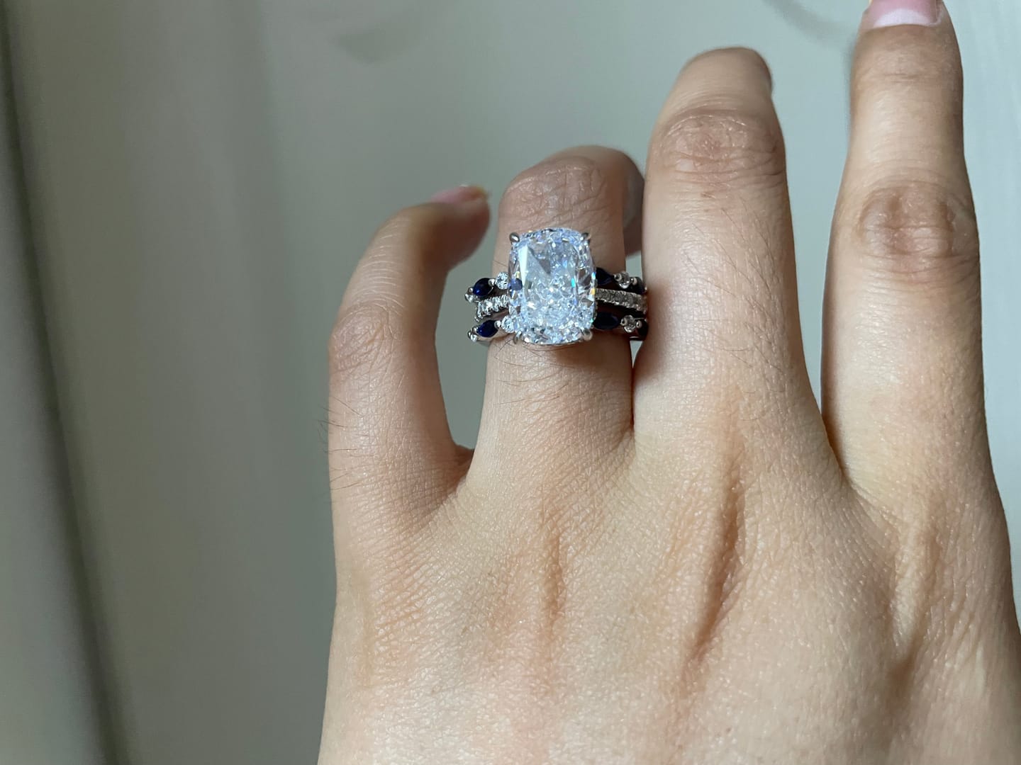 Customer photo review of S925 6.5Ct Cushion Cut Insert Wedding Ring Set With Unique White & Blue/Red Stone Engagement Ring Enhancer