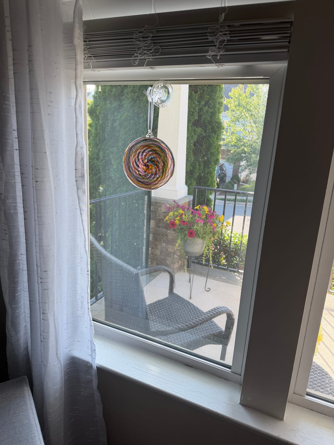 Customer photo review of Glass Disc Suncatcher with Cremation Ash