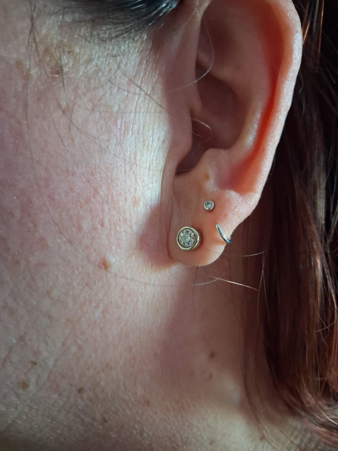 Customer photo review of Stay Close Moissanite Bezel Hoops
