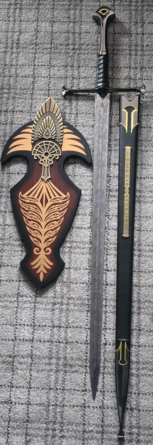 Customer photo review of Lord of the Rings Sword of King Elessar Aragorn Anduril Metal Sword With Wall Plaque Exclusive Editon