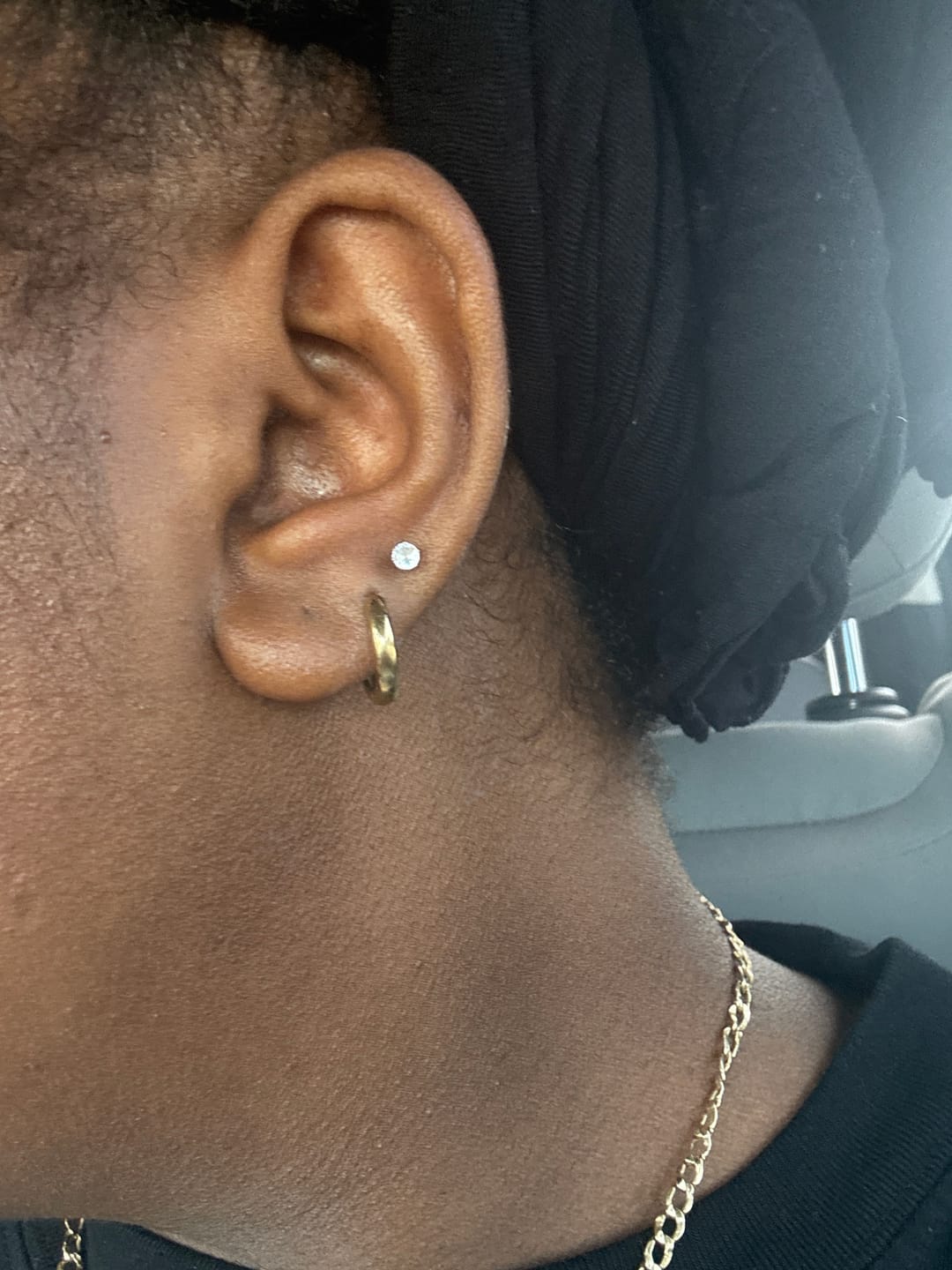 Customer photo review of Minimal Huggie Earrings