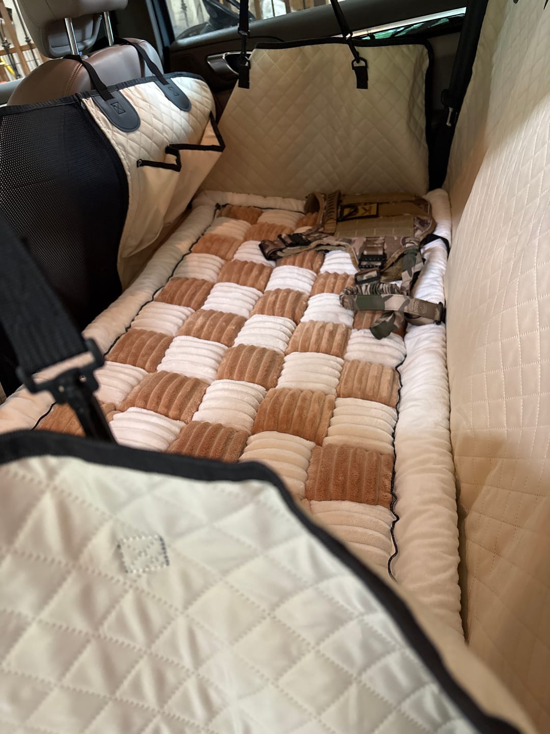 Customer photo review of NEW Waterproof Hard Bottom Car & Truck Seat Foldable Hammock Cover With Storage Pockets, Side Flaps, Headrest Straps, Seat Anchors, & Mesh Window (+FREE SAFETY BELT!)