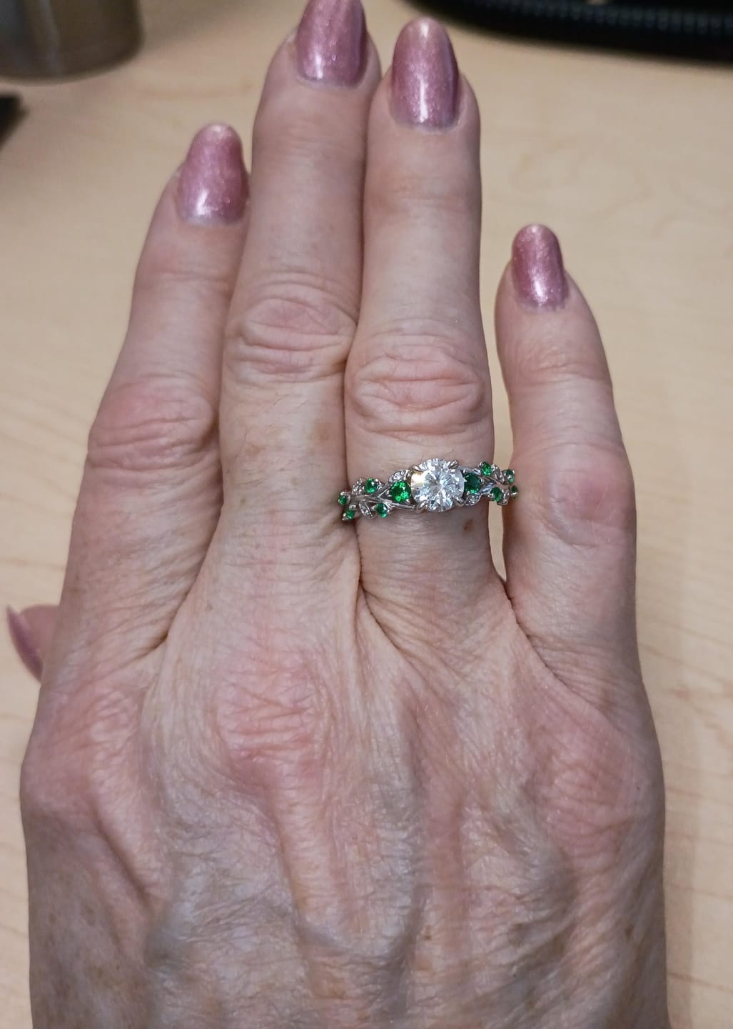 Customer photo review of Willow Leaf & Vine Moissanite with Emerald Accents Engagement Ring
