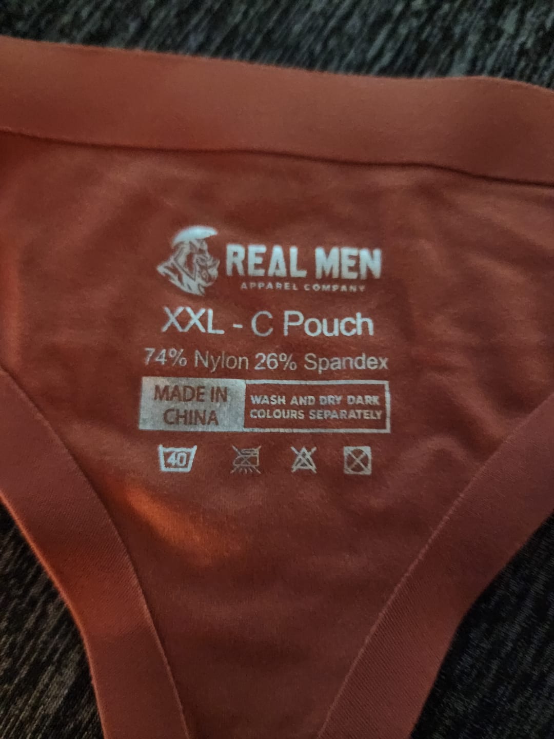 Customer photo review of Brushed Nylon Seamless 0in Thongs No Fly 3pk Black/Nightfall/Red Stone
