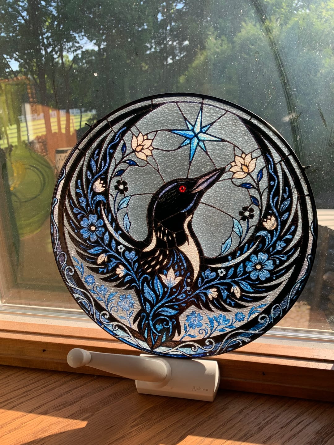 Customer photo review of Floral Rebel Loon Stained Glass Suncatcher - Minnesota Bird