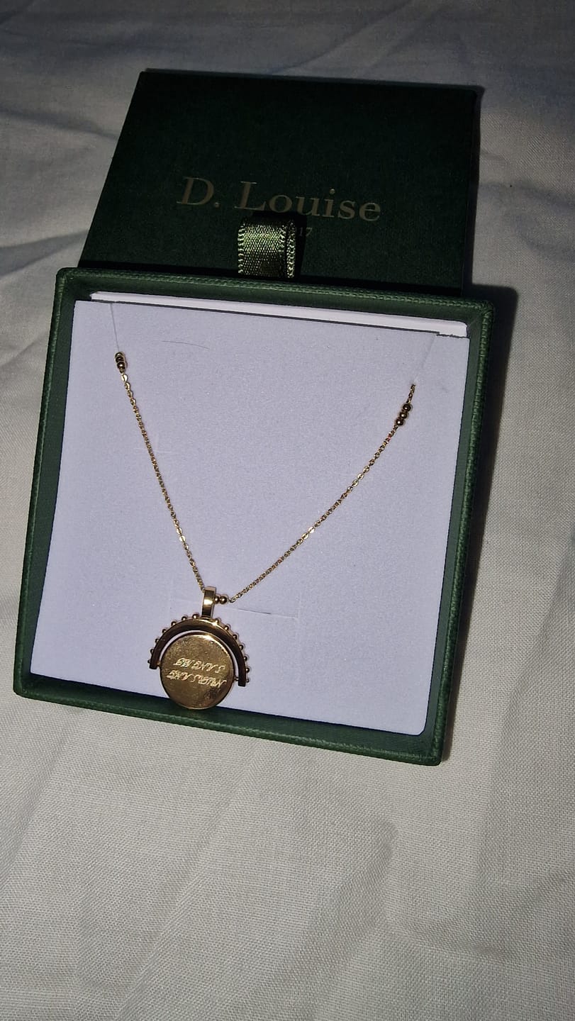 Customer photo review of Engravable Spinning Necklace