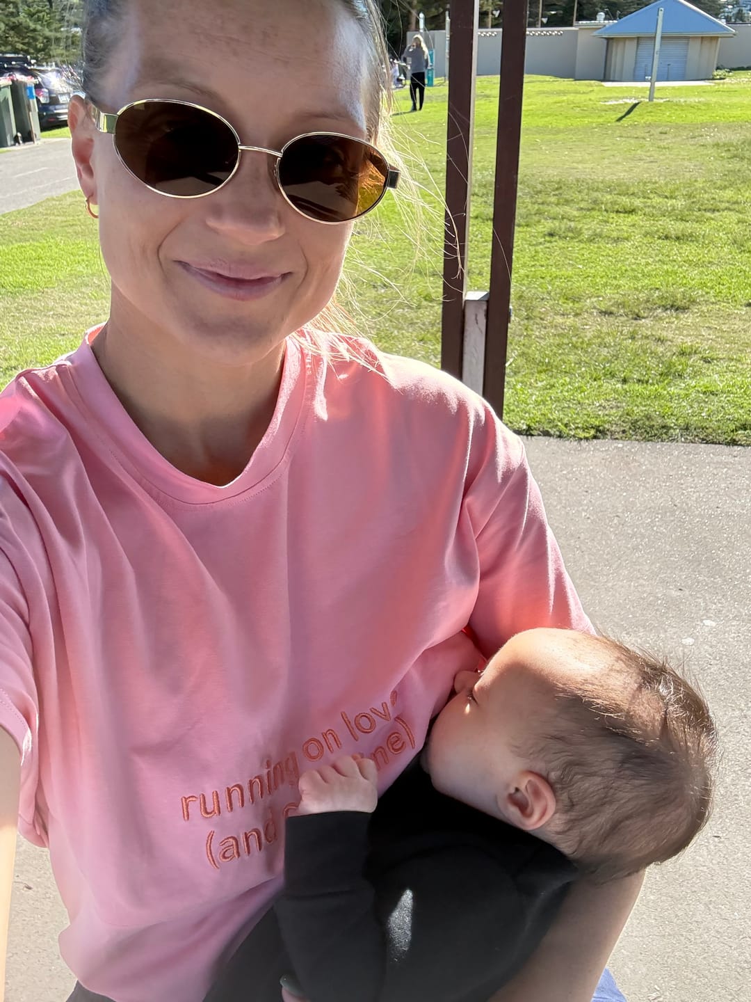 Customer photo review of Pink Breastfeeding Tee with Hidden Zip – "Running on Love (and caffeine)"