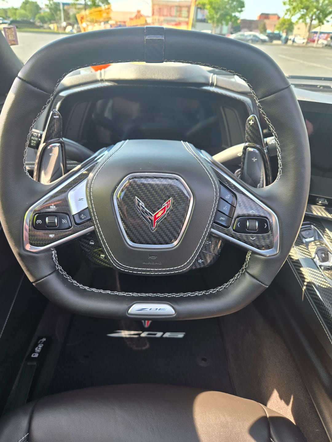 Customer photo review of C8 Corvette Real Carbon Fiber Steering Wheel Airbag Center Cover | Interior Overlay (2020–2026)
