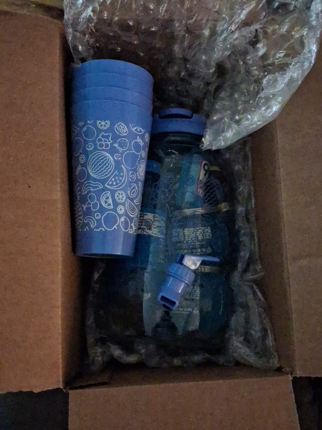 Customer photo review of 3 Brothers Liquor Blue Bittles Chug Jug Alcohol Cocktail Bucket