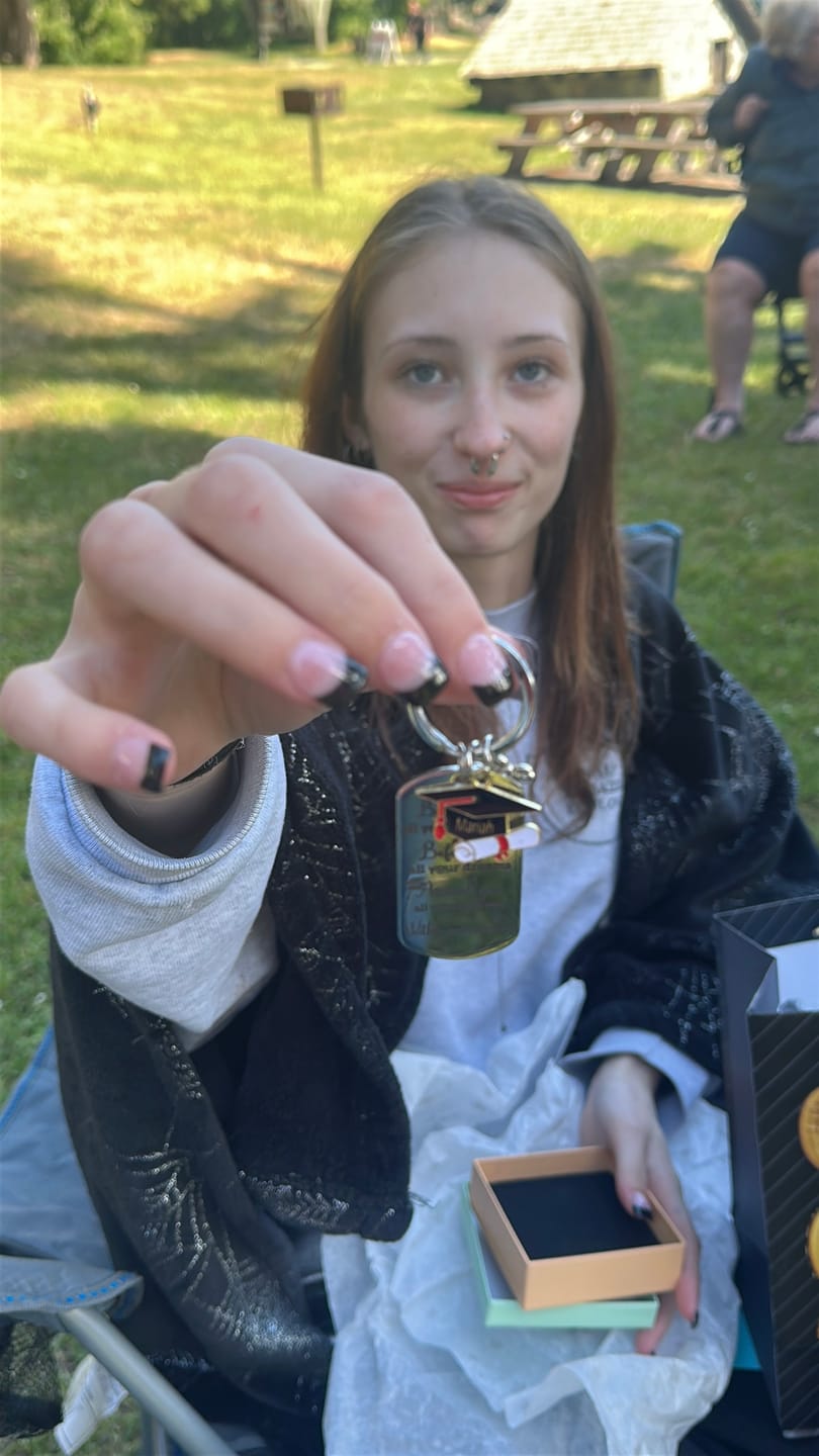 Customer photo review of Family Personalized Custom Graduation Keychain - Graduation Gift For Family Members, Brothers, Sisters