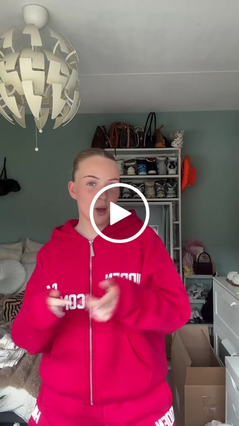 Customer video review of GATED COMMUNITY ZIP HOODIE RASPBERRY RED