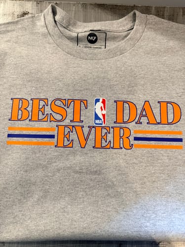Customer's grey t-shirt with a vibrant "Best Dad Ever" print, showing the results of the DTF powder.