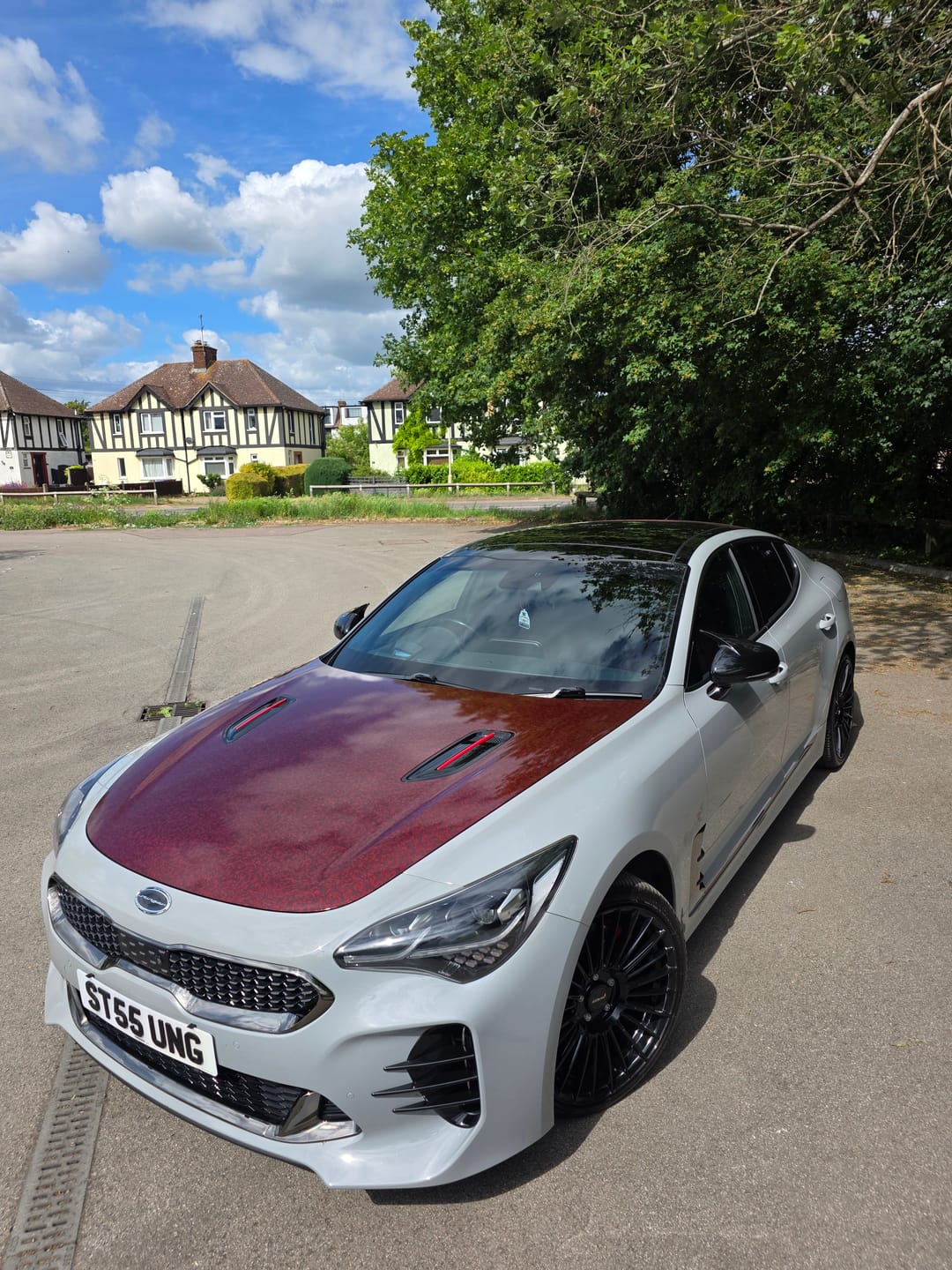 Customer photo review of Red Forged Carbon Fiber Vinyl Wrap