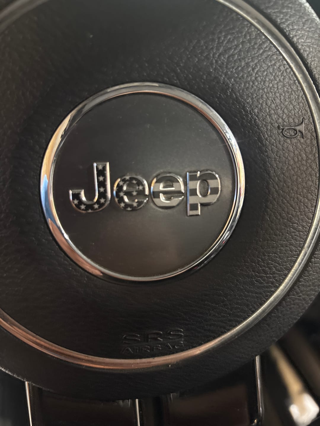Customer photo review of JEEP Steering Wheel Emblem Overlay Decal — 30+ Colors & Designs (Flag, Topo, Animal, Solid)