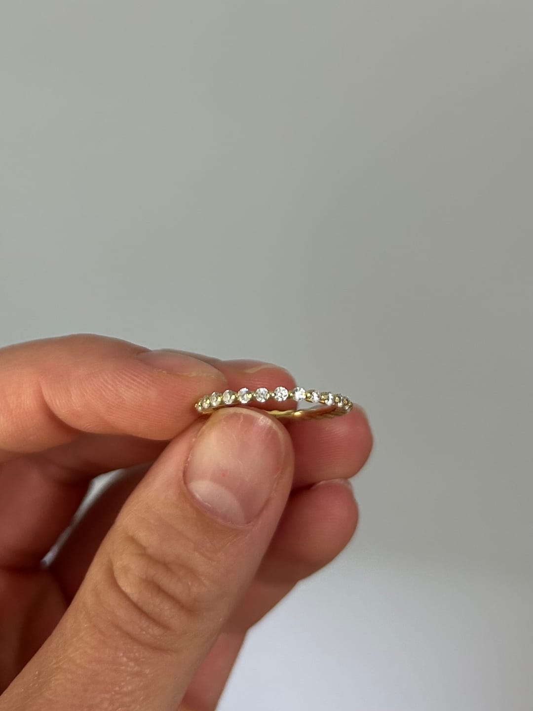 Customer photo review of Louily Classic Round Cut Full Eternity Wedding Band In Sterling Silver