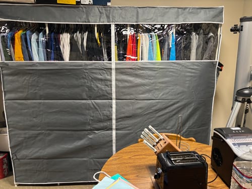 Customer photo review of Raybee 90.6''W Heavy Duty Clothes Rack with Cover,1200lbs Freestanding Garment Rack for Bedroom