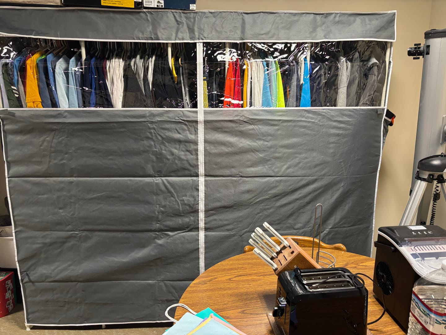 Customer photo review of Raybee 90.6''W Heavy Duty Clothes Rack with Cover,1200lbs Freestanding Garment Rack for Bedroom