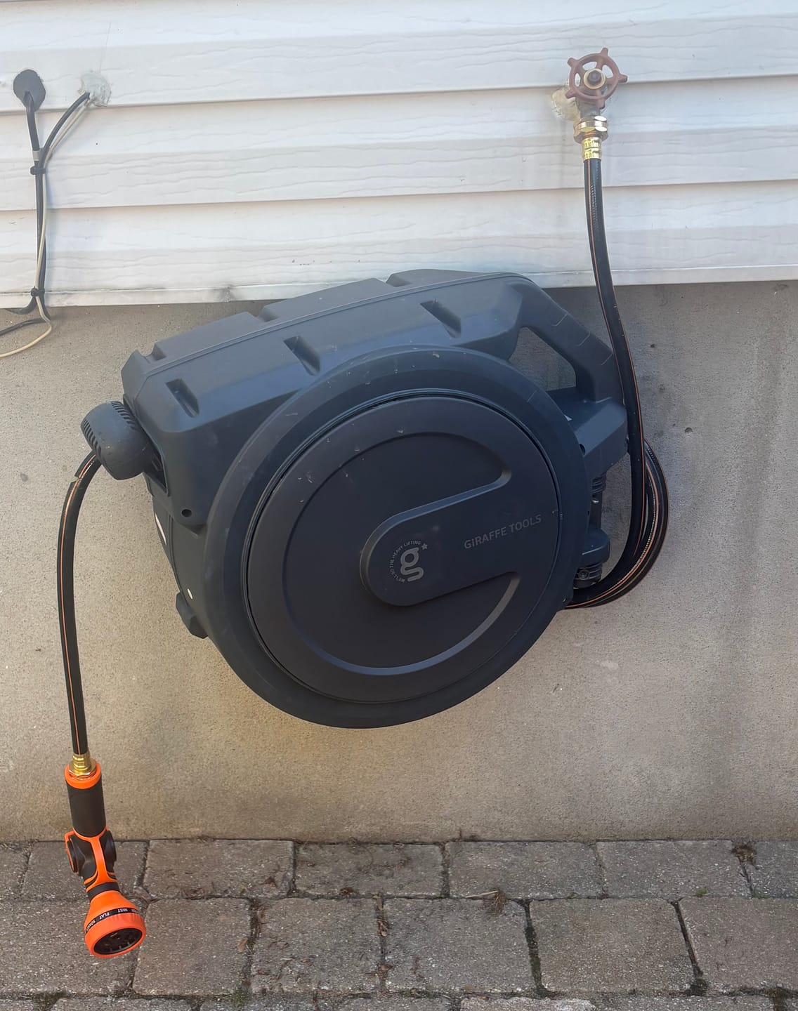 Customer photo review of Retractable Garden Hose Reel-1/2in-100ft