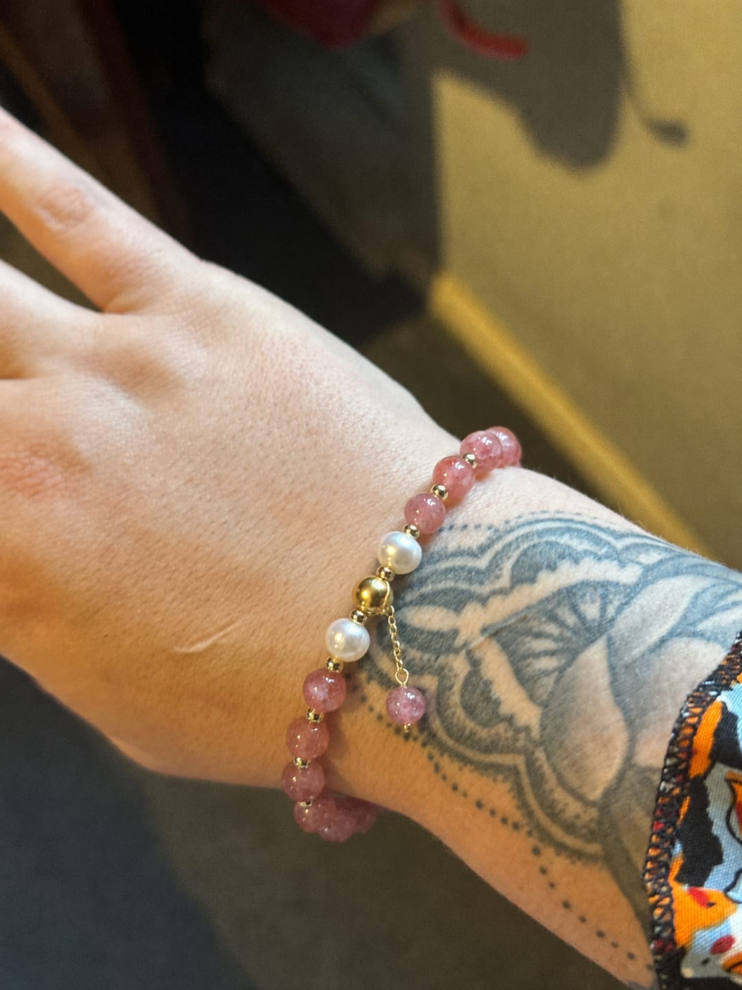 Customer photo review of Presence & Compassion Array – Natural Strawberry Quartz & Pearl Bracelet