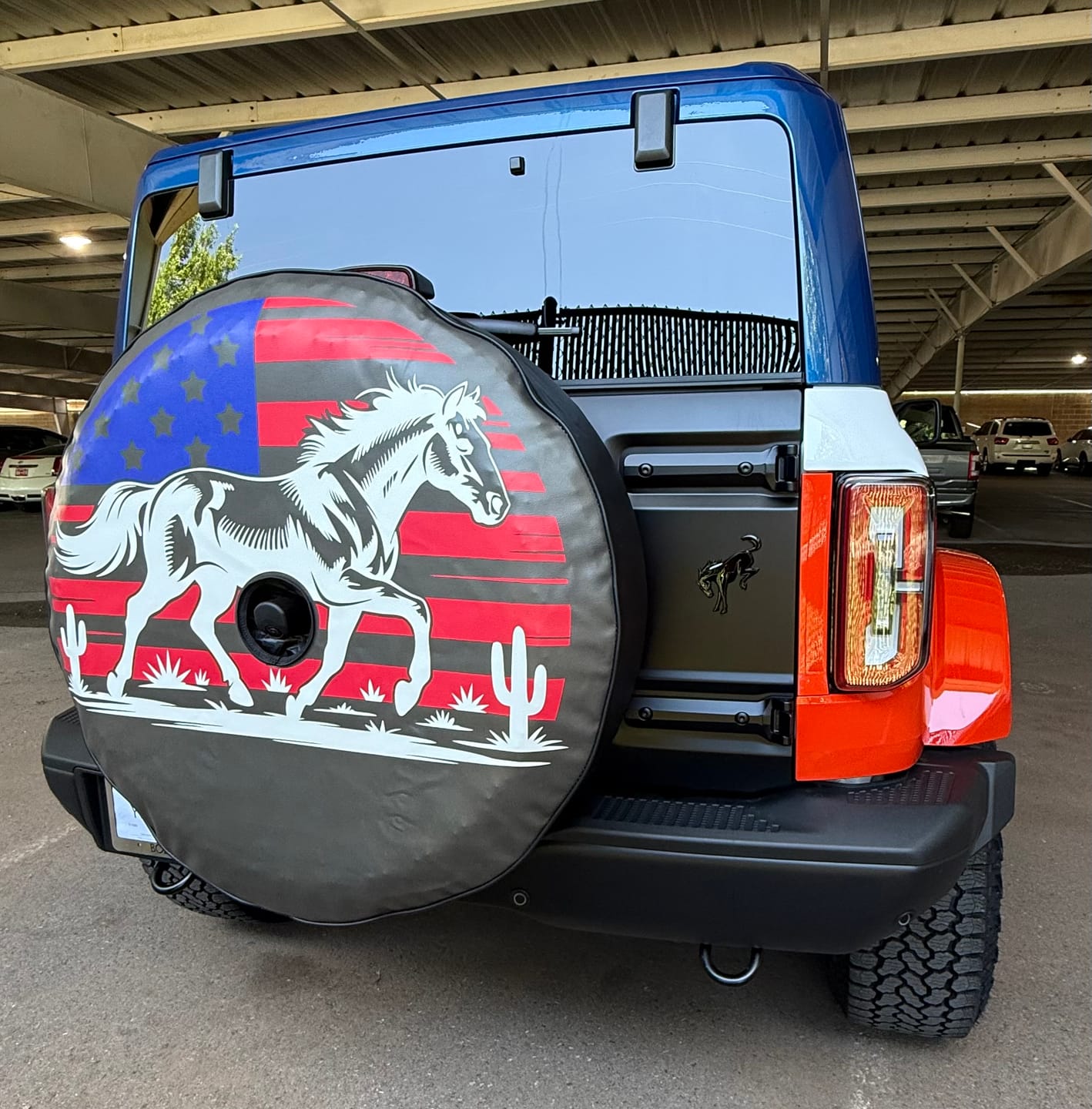 Customer photo review of Bronco Horse with American Flag Spare Tire Cover for Jeep, Bronco, RV, Camper, Trailer, & More