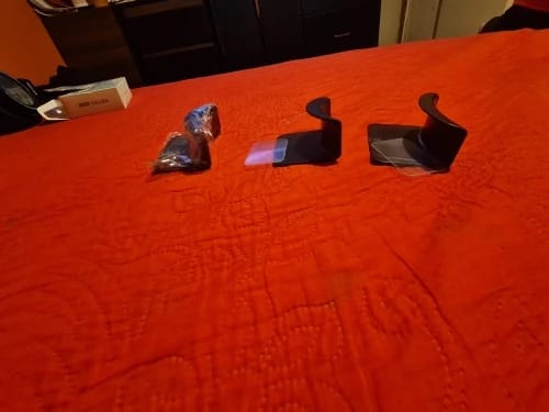 Customer photo review of Universal Headphone Stand – Under-Desk Headset Hanger