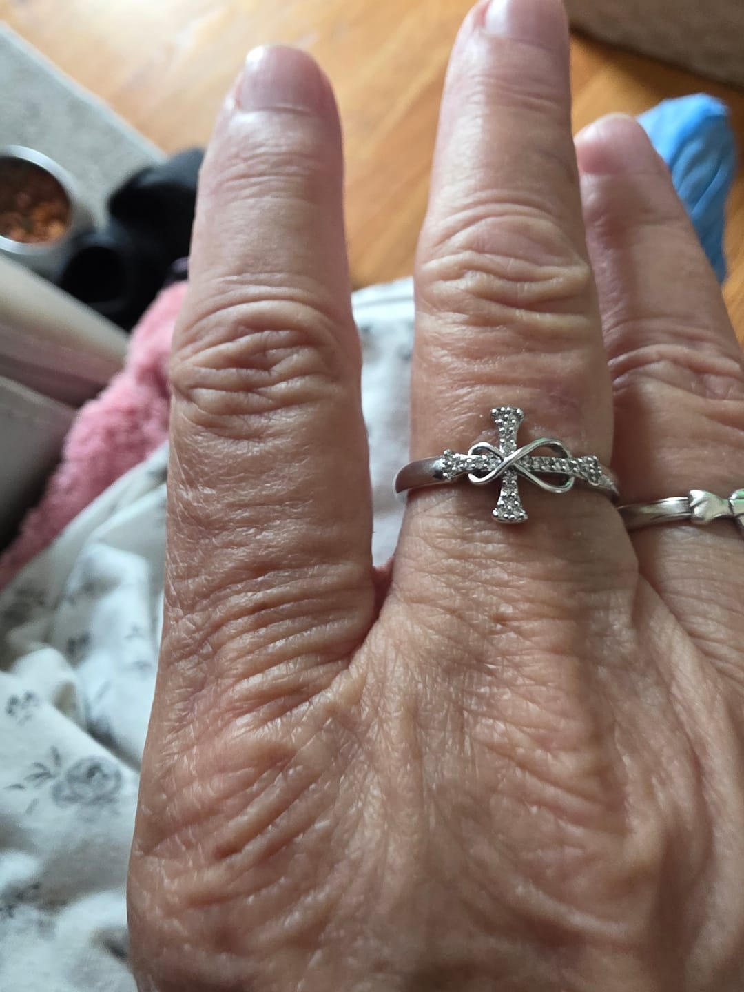 Customer photo review of Christianartworkshop Golden/Silver Mobius Cross Ring: Carry His Grace in Daily Wear