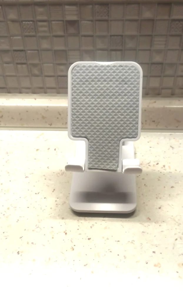 Customer photo review of Adjustable Phone & Tablet Stand – Universal Foldable Desk Holder