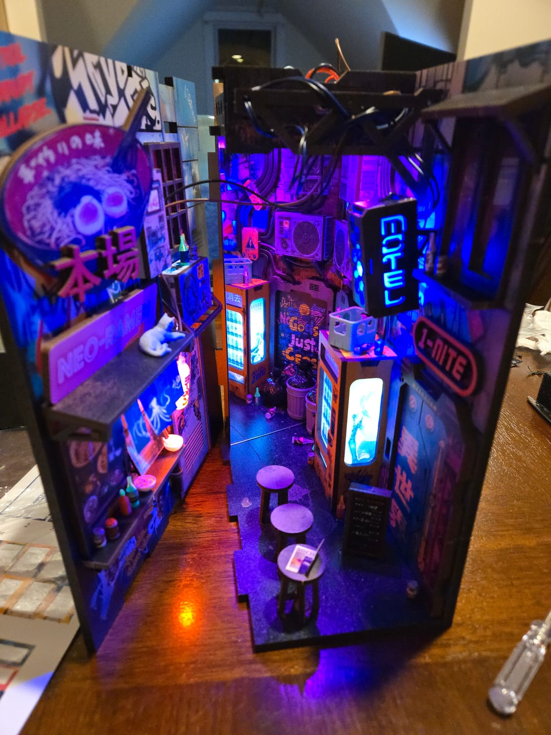 Customer photo review of Neon Ramen MiniAlley Cyberpunk DIY Book Nook Kit, Scale Model Kit,  Japanese Ramen Shop Miniature Scene