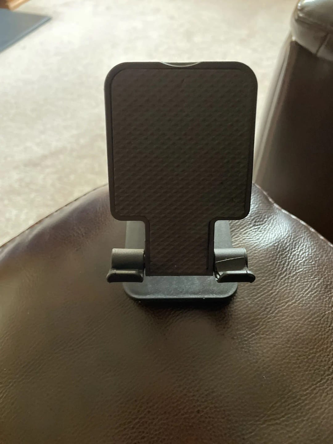 Customer photo review of Adjustable Phone & Tablet Stand – Universal Foldable Desk Holder