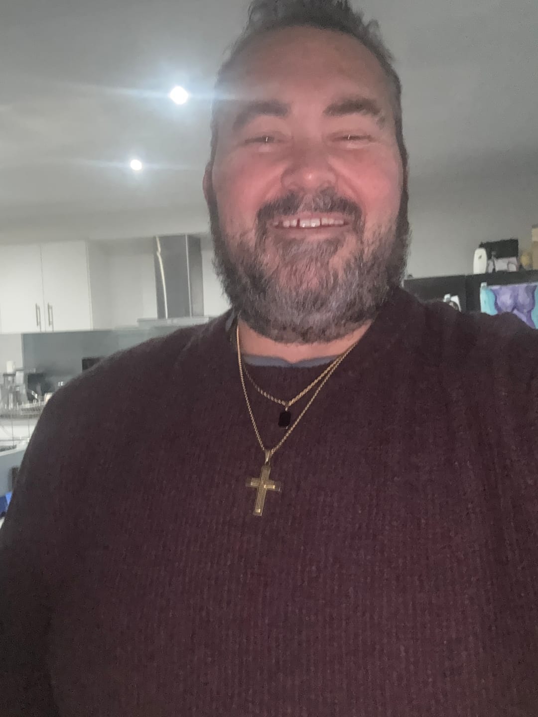 Customer photo review of Minimalist Tricolor Cross Necklace Embodying Faith and Simplicity