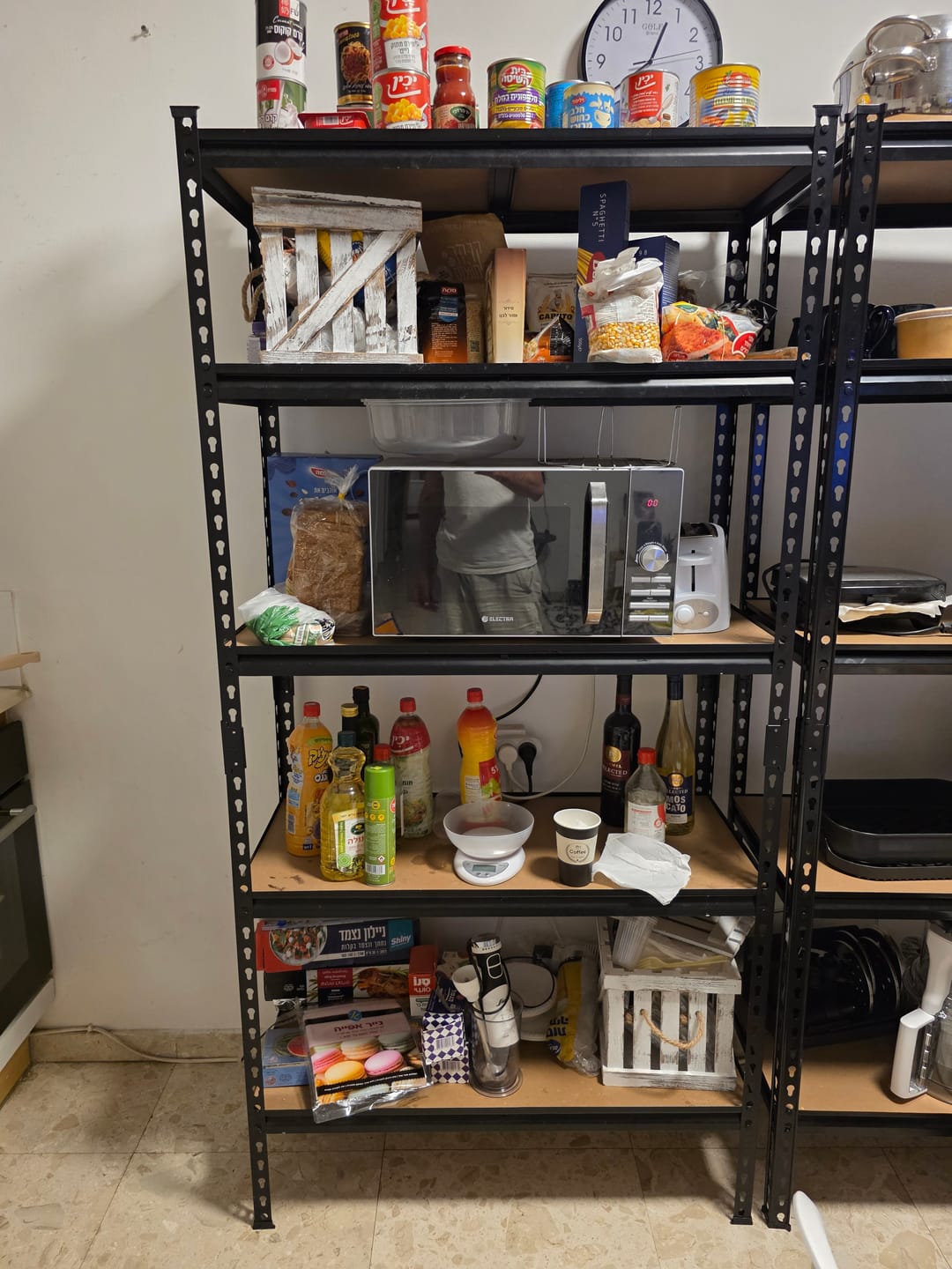 Customer photo review of כוננית מתכת פרמיום 5 מדפים מודולריים גובה 1.8 מטר