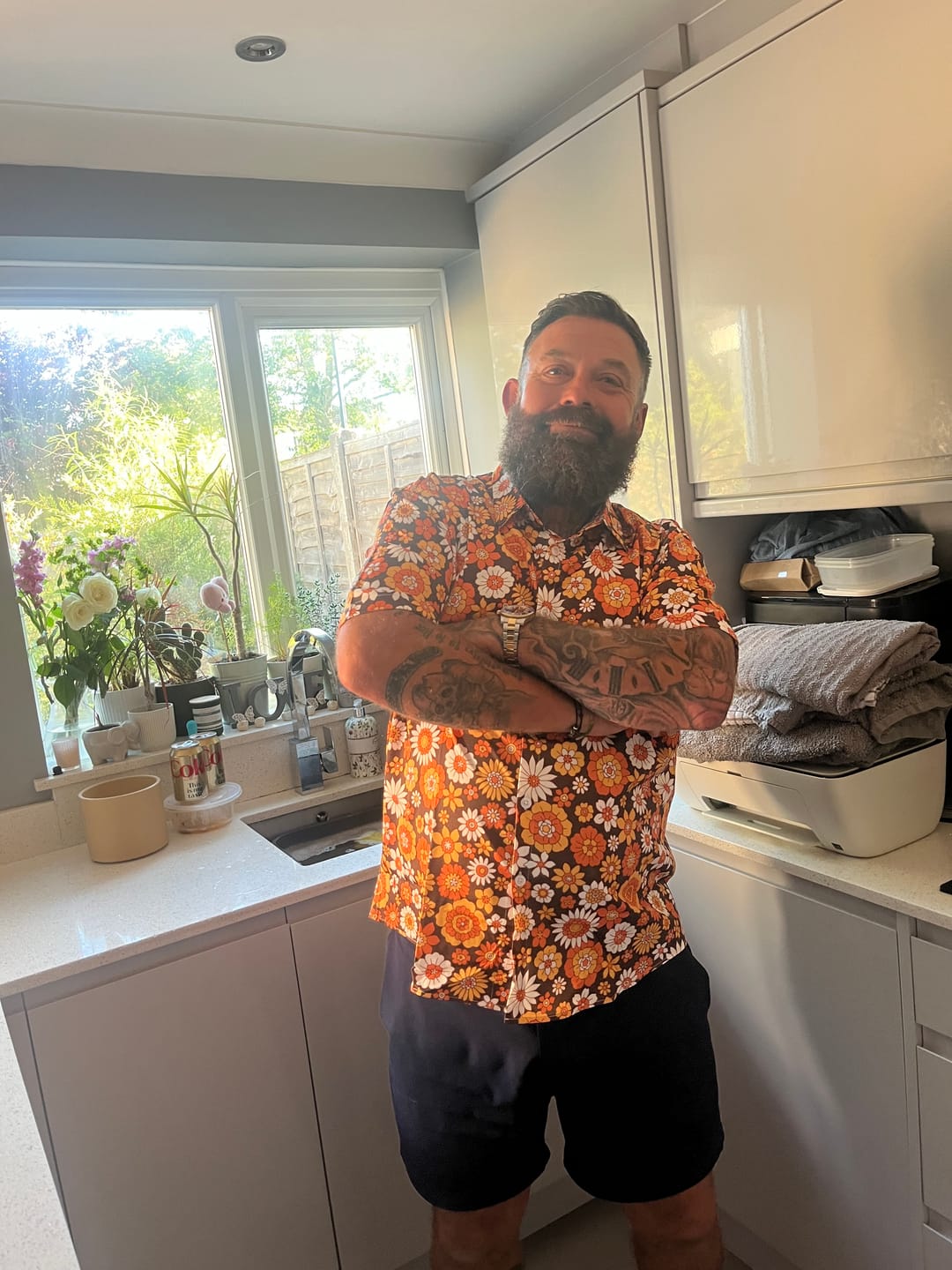 Customer photo review of Men's Floral Vintage Flower Button Up 70s Themed Disco Party Short Sleeve Beach Summer Shirt
