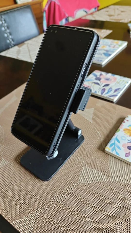 Customer photo review of Adjustable Phone & Tablet Stand – Universal Foldable Desk Holder